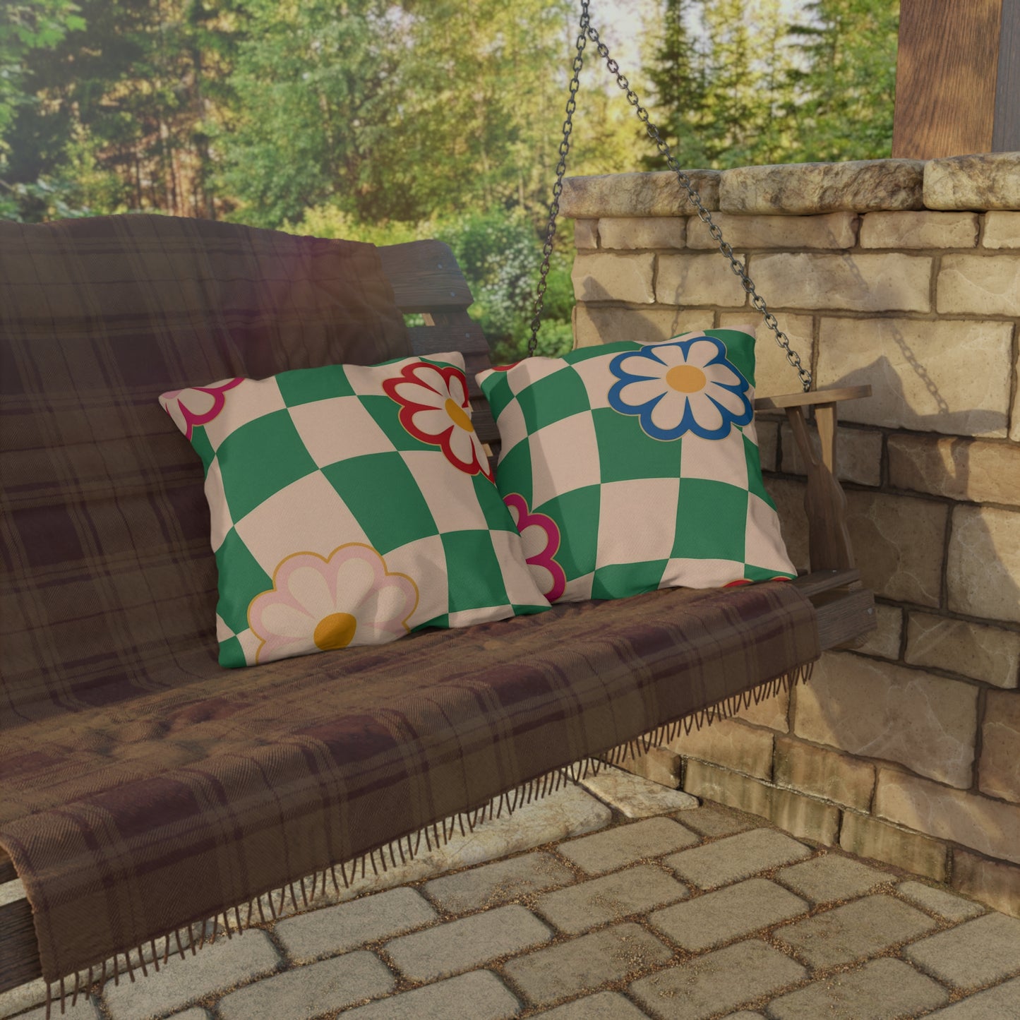 Spun polyester outdoor cushion with multi-colored flowers for summer setup