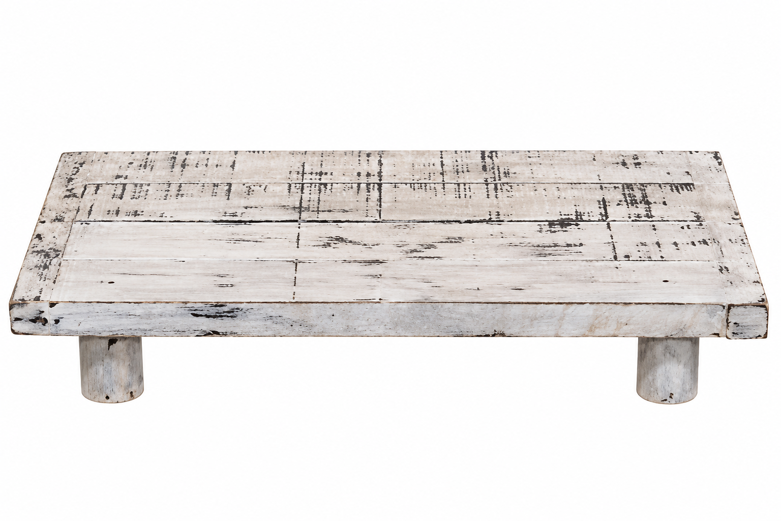 A rustic rectangular wooden platform table with a distressed white and gray finish, supported by two short cylindrical legs, shown against a plain white background.
