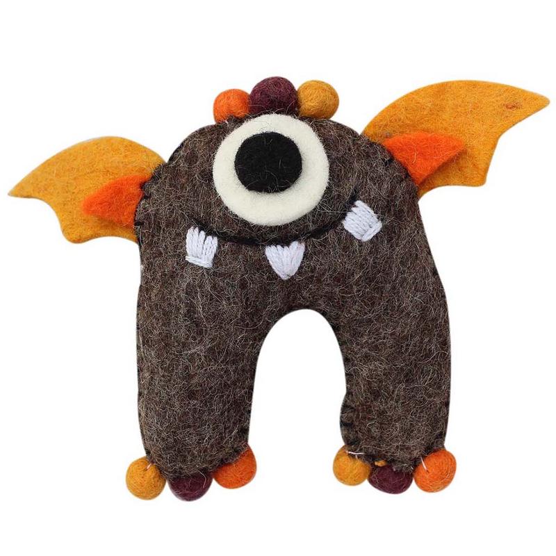 Soft wool monster keepsake pillow, ethically crafted in Nepal.