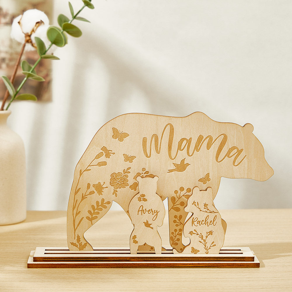 A wooden table decoration featuring a mama bear and two cubs, each customizable with the customer's choice of text, showing the arrangement of the three pieces.