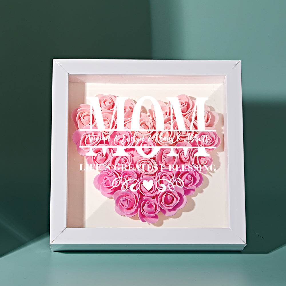 Custom name floral shadow box in white frame, featuring soft pink and white roses