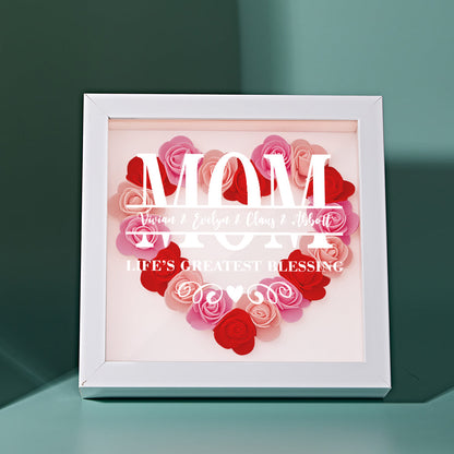 Personalized keepsake shadow box with pink and white artificial floral arrangement