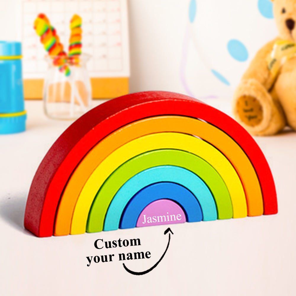 Versatile rainbow stacking toy made of durable, child-safe wood, ideal for early STEM learning and cognitive development.