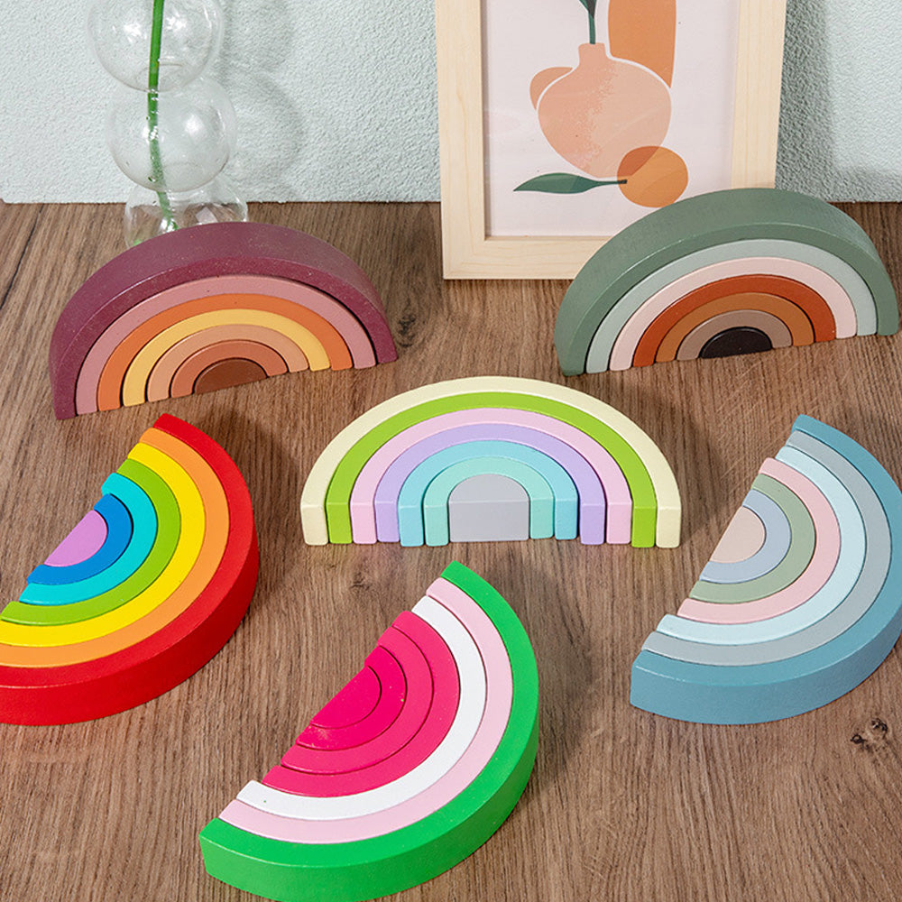 Montessori wooden rainbow stacker toy designed for open-ended play and early childhood learning. Available in multiple earth-tone colors.