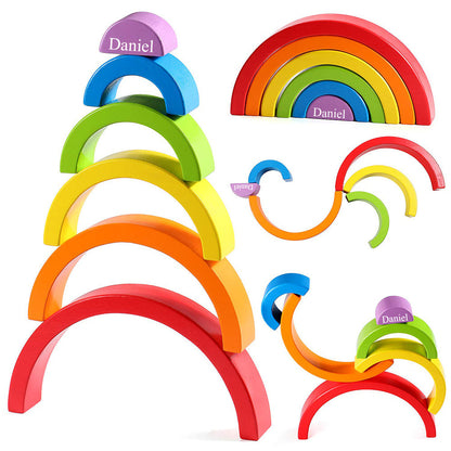 Wooden stacking rainbow bridge toy designed to enhance early learning, creativity, and problem-solving in young minds.