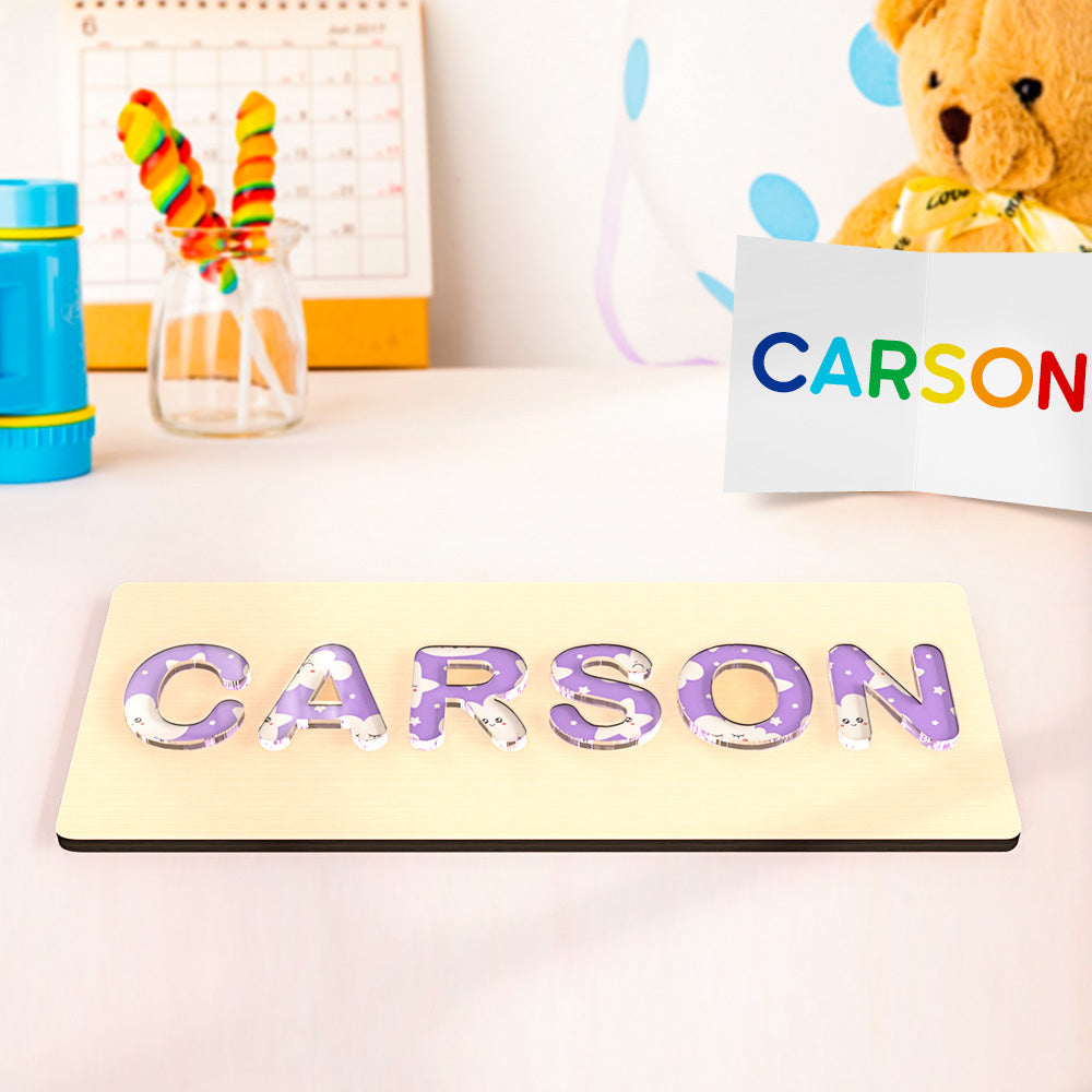 Montessori-inspired custom name puzzle made from wood and acrylic, available in multiple styles, ideal for baby shower gifts and first birthdays.