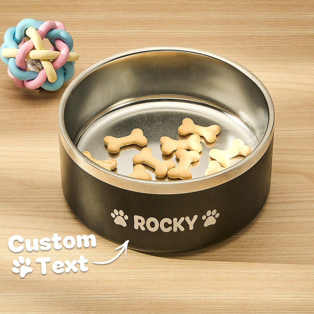 High-quality stainless steel pet bowl with a custom name engraving and non-slip bottom, perfect for dogs or cats in blue, red, or black.