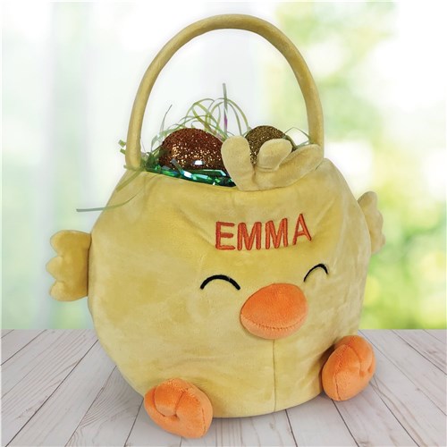 Soft chick Easter basket for toddlers and kids’ egg hunts – A plush embroidered Easter basket shaped like a baby chick, sitting on a table, perfect for Easter gifts, spring celebrations, and festive keepsakes.