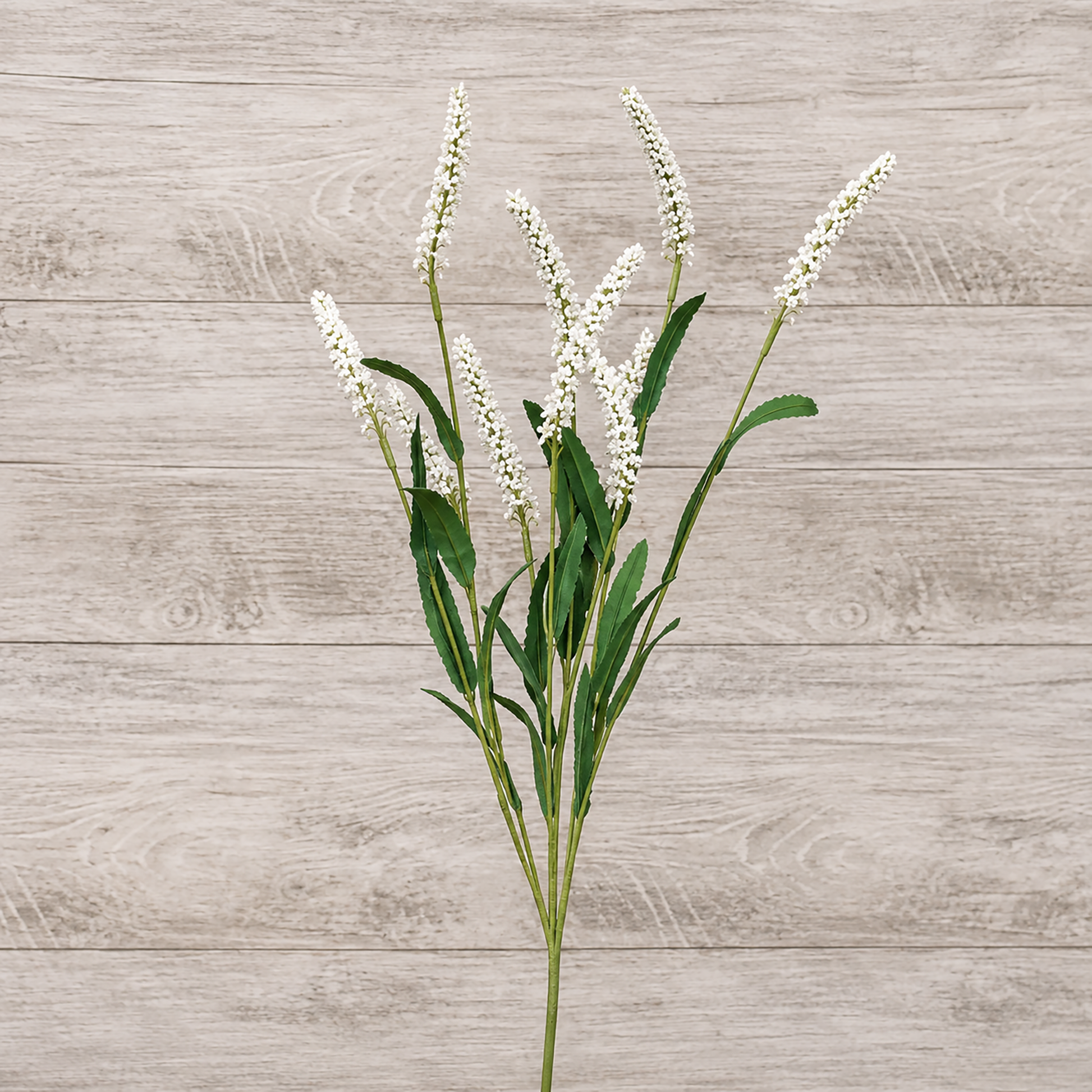 Artificial white floral spray with dark green leaves for rustic farmhouse decorating, primitive home decor, shelf styling, centerpiece arrangements, and country floral displays