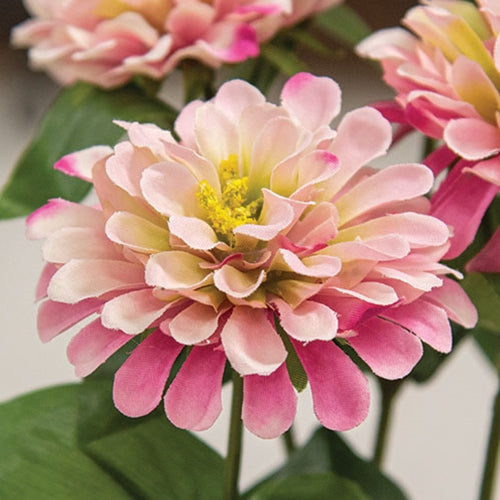 Bright pink zinnia flower pick with soft green accents and realistic details