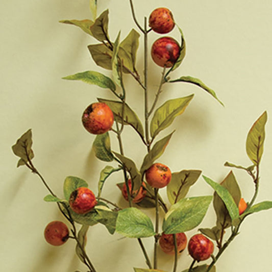 Faux crab apple branch with red apples and green leaves for rustic fall floral displays