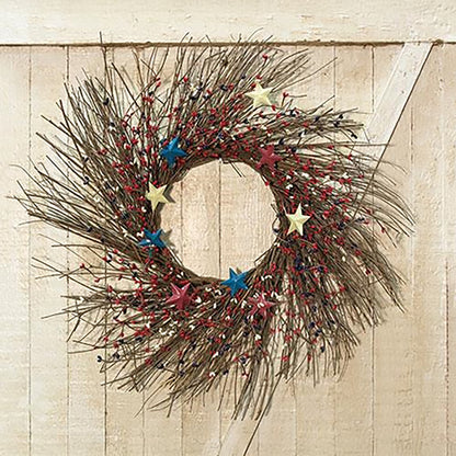 Americana pip berry sunburst wreath with burgundy ivory and navy berries and rustic metal stars for farmhouse patriotic decor