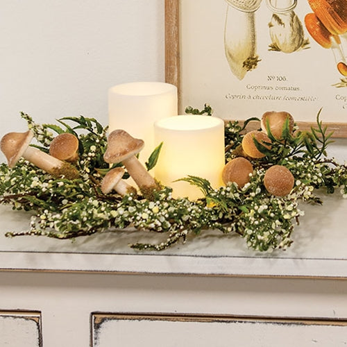 Top-down view of mushroom ring wreath with brown base and soft foam textures