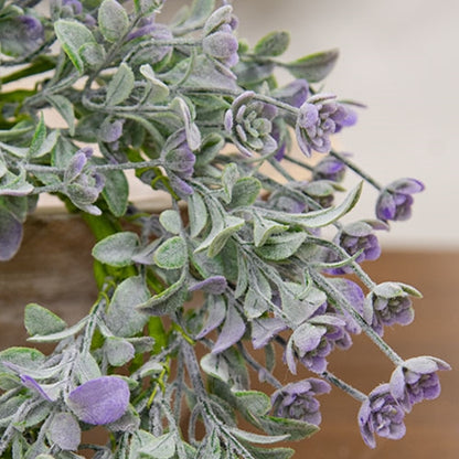 Dusk lavender spring floral candle wreath with soft botanical texture
