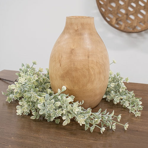 Faux hanging greenery bush with soft green stems and white lavender buds for country or rustic decor