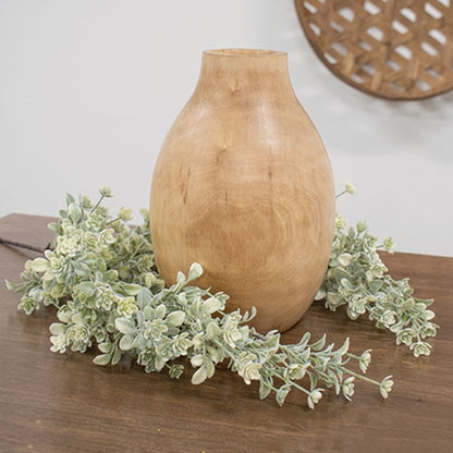 Faux hanging greenery bush with soft green stems and white lavender buds for country or rustic decor