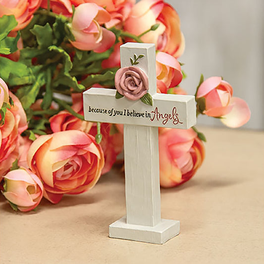 Small white resin cross with pink rose and heartfelt “I believe in angels” text, perfect for rustic sympathy décor