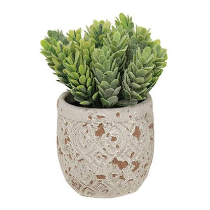 Small artificial plant with rustic charm in terracotta-accented pot