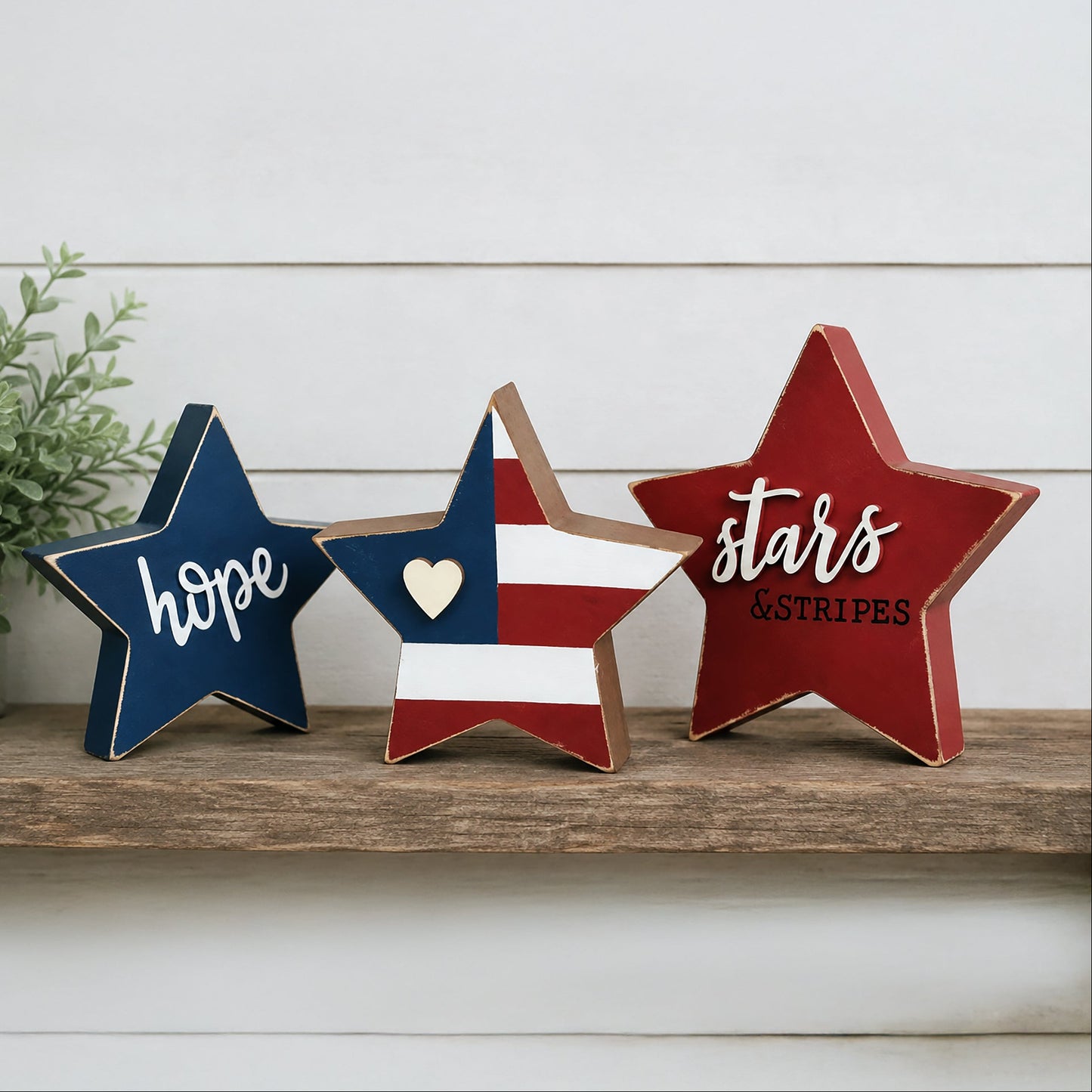 Rustic patriotic wooden star sitter set with distressed Americana finishes and farmhouse shelf decor styling