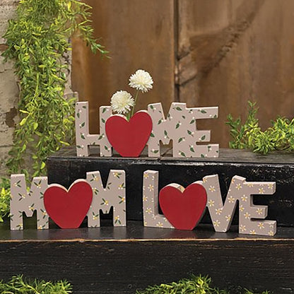 Floral wooden block words Home Love Mom with red heart vase cutouts on rustic shelf décor