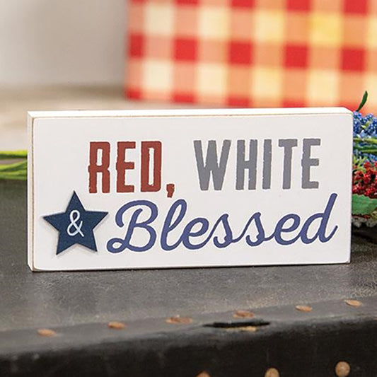 Rustic red white and blue wooden block with “Red, White & Blessed” quote and blue star cutout for patriotic farmhouse décor
