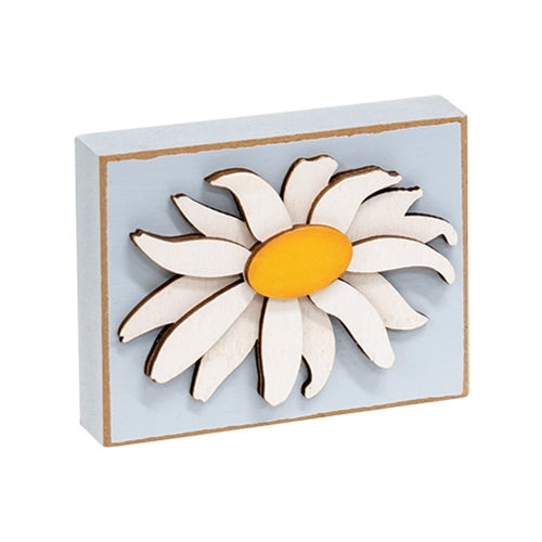 Close-up of wood daisy block with dimensional floral detail
