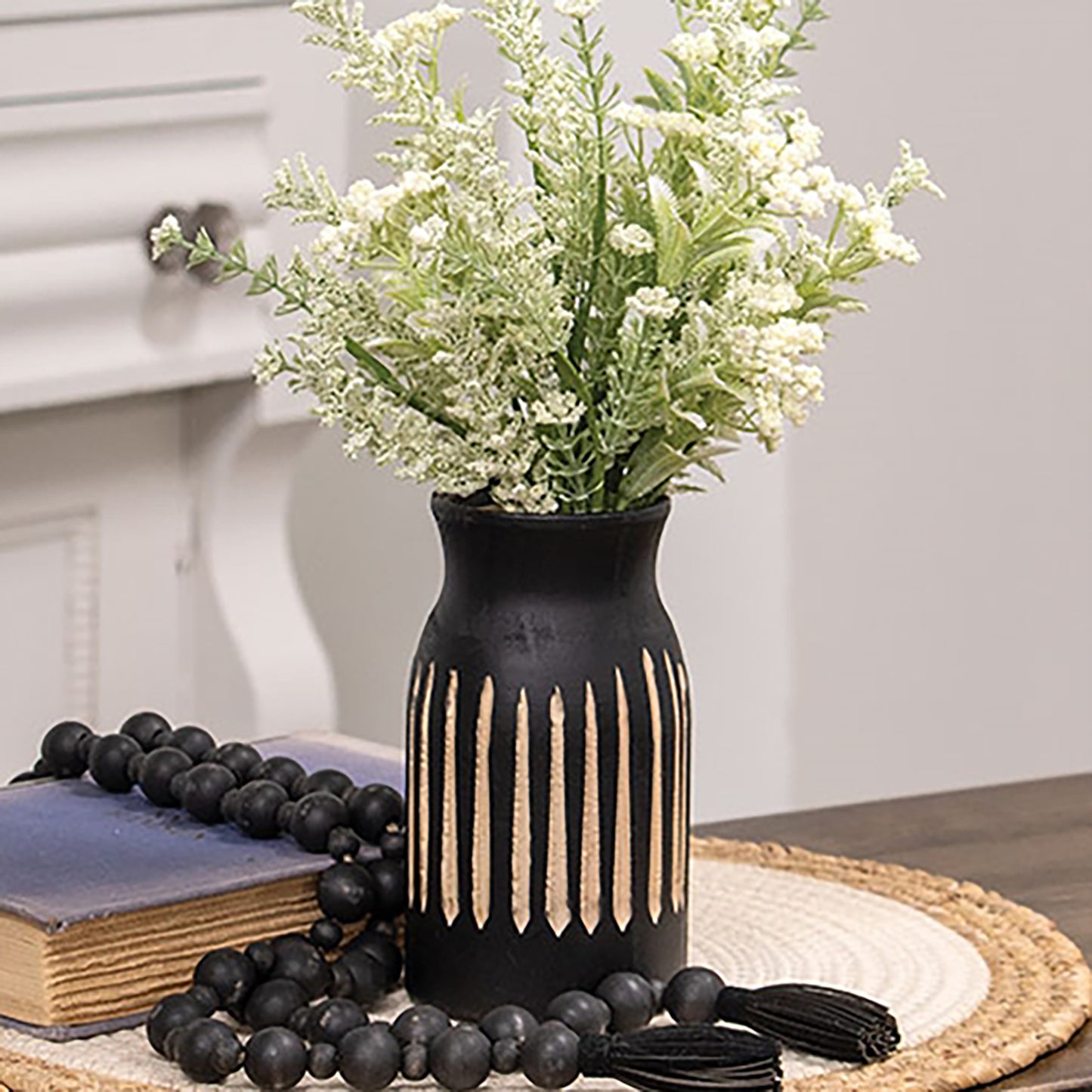 BoHo black wooden vase with carved stripes and matte finish