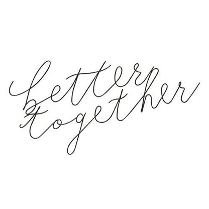 Close-up of matte black script-style "better together" metal lettering