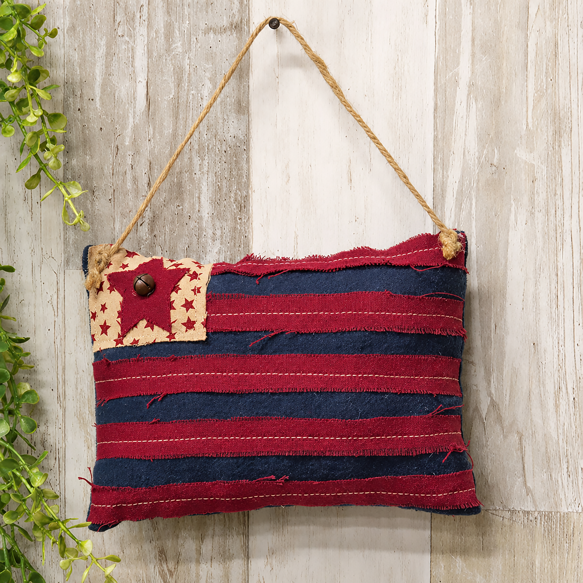Vintage Stars and Stripes patriotic pillow hanger with rustic farmhouse Americana styling and jute rope hanger