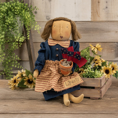 Vintage Stars and Stripes Liberty doll with primitive Americana farmhouse styling and rustic patriotic decor accents