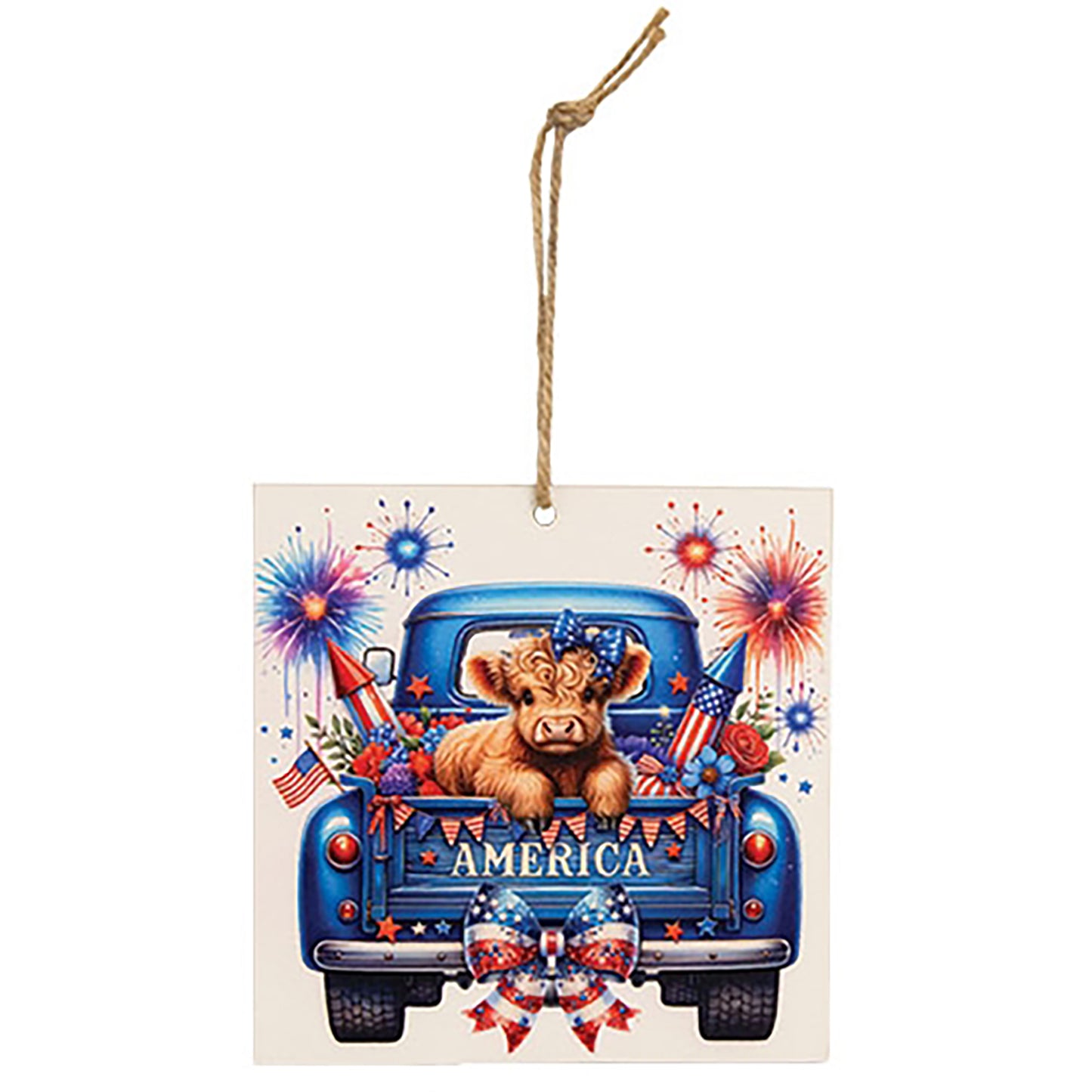 Wooden patriotic Highland cow hanging ornament displayed on rustic tiered tray with farmhouse Americana decorations