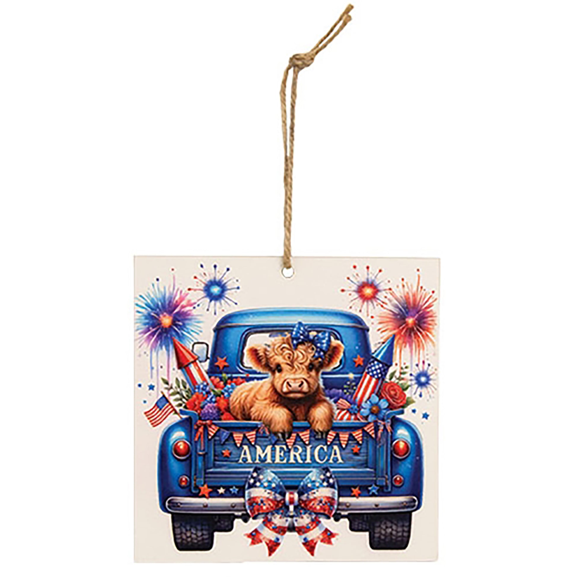 Wooden patriotic Highland cow hanging ornament displayed on rustic tiered tray with farmhouse Americana decorations