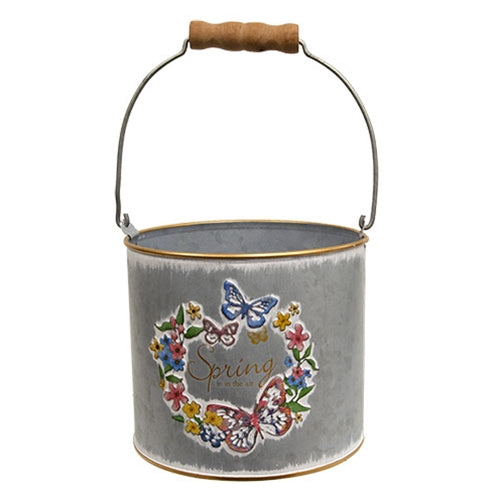 Nesting metal spring decor buckets with floral motif