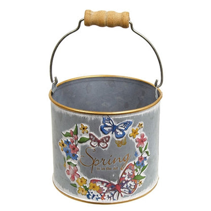 Embossed "Spring is in the Air" butterfly design on rustic metal bucket