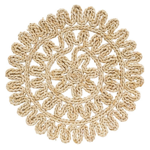 Flower-shaped corn husk table mat with woven texture and layered petals