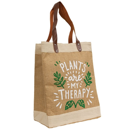 Rustic canvas tote with faux leather handles and silver grommets