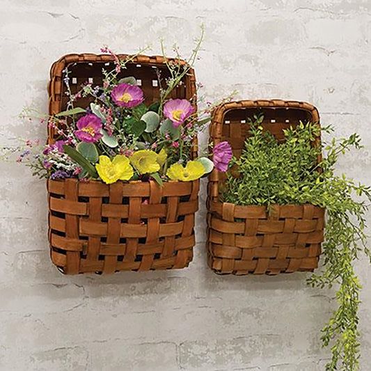 Set of two brown tobacco baskets with interwoven wood design and pocket shape