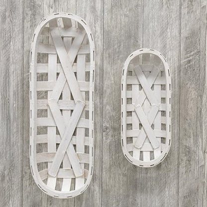 Close-up of distressed white wood basket texture and woven crisscross detail.