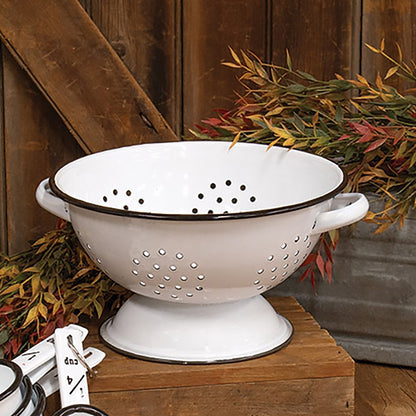 Enamelware colander with distressed white finish and black edging for rustic farmhouse décor