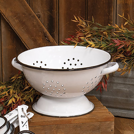 Enamelware colander with distressed white finish and black edging for rustic farmhouse décor