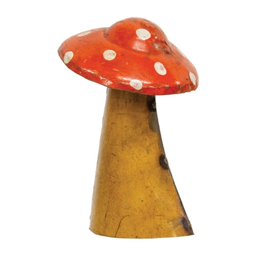 Freestanding red mushroom sculpture with wide mustard-colored stem