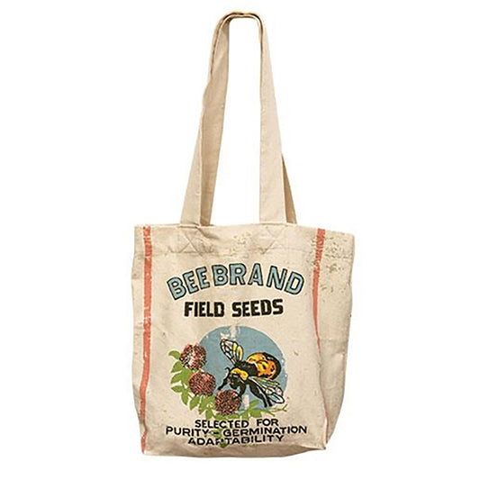 Rustic cotton tote bag with bee-themed vintage-style graphic, pink stripes, and floral details, perfect for farmhouse decor or everyday use