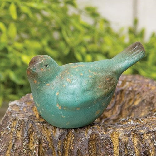 Antiqued resin bird figurine with chipped blue and brown finish