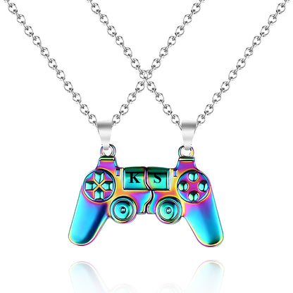 Side-by-side view of a magnetic gamer necklace set, featuring two alloy controller charms that connect seamlessly.