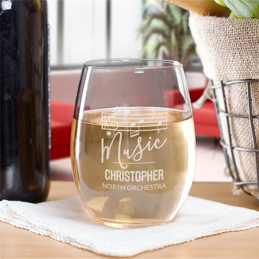 Personalized stemless wine glass with engraved music staff and notes design for musicians and music lovers