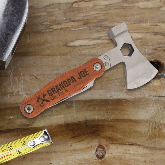 Engraved Mr. Fix It multi-tool with custom text. Includes hammer, wrench, hatchet, screwdriver, knife, saw, and carry bag—perfect gift for handy dads or grandpas.