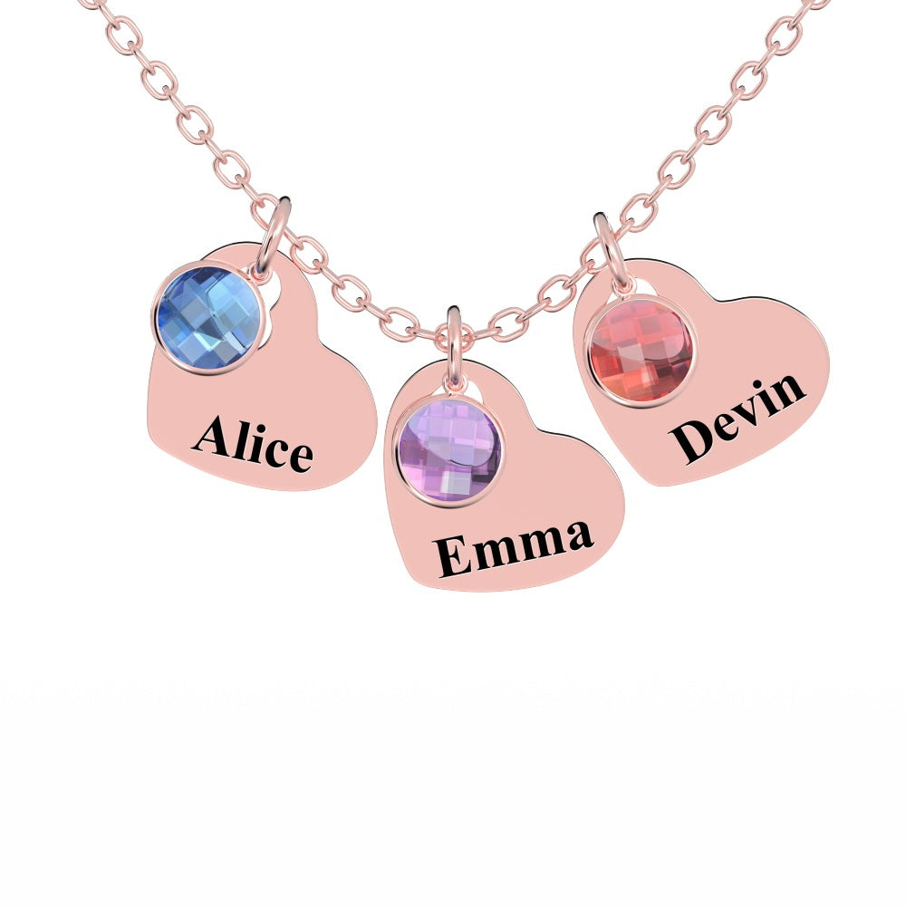 Rose gold necklace with three birthstone charms, each engraved with a name.