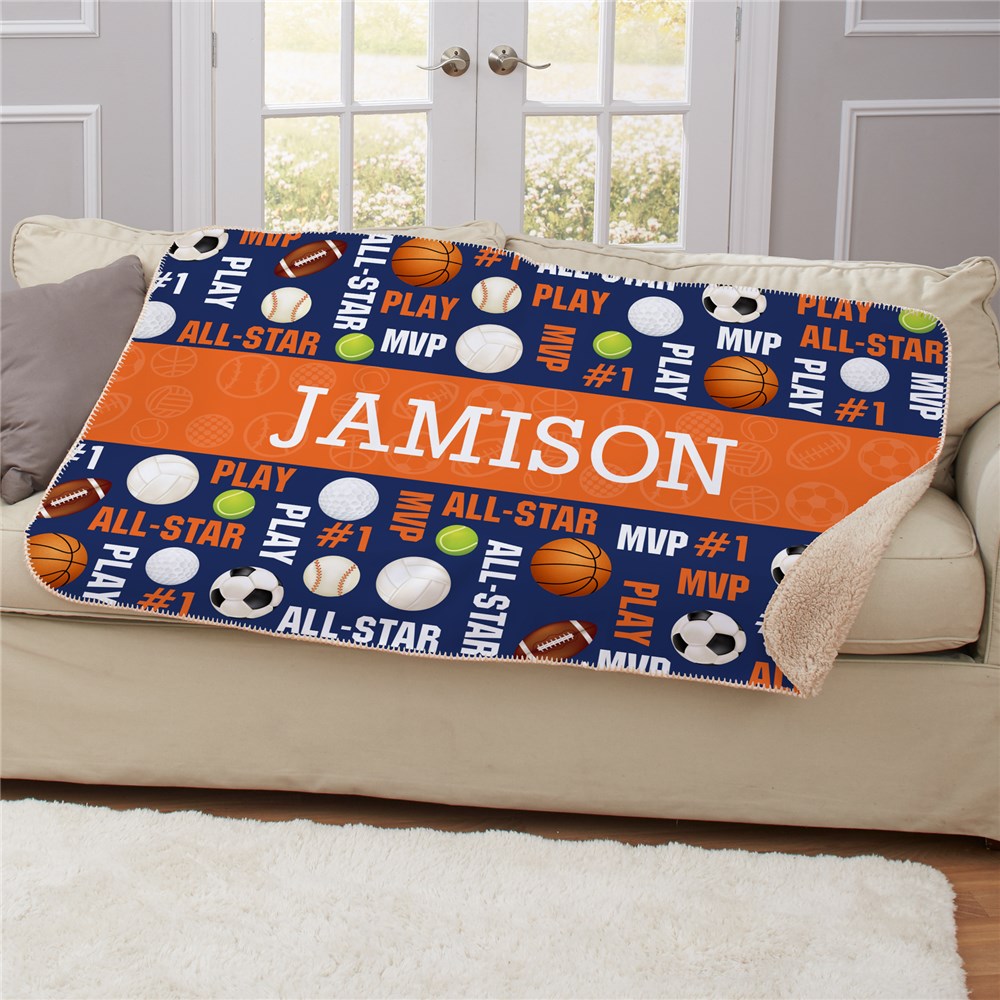 Personalized sherpa blanket with sports ball design and custom name for kids or teens