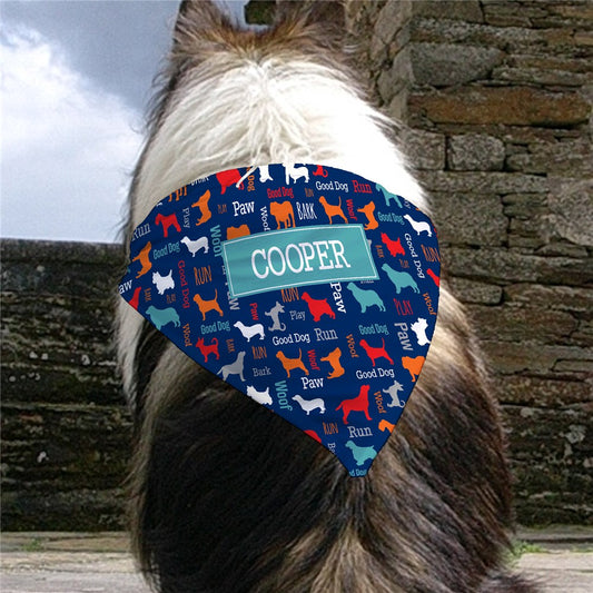 Custom pet bandana with colorful print and personalized name displayed on the front.