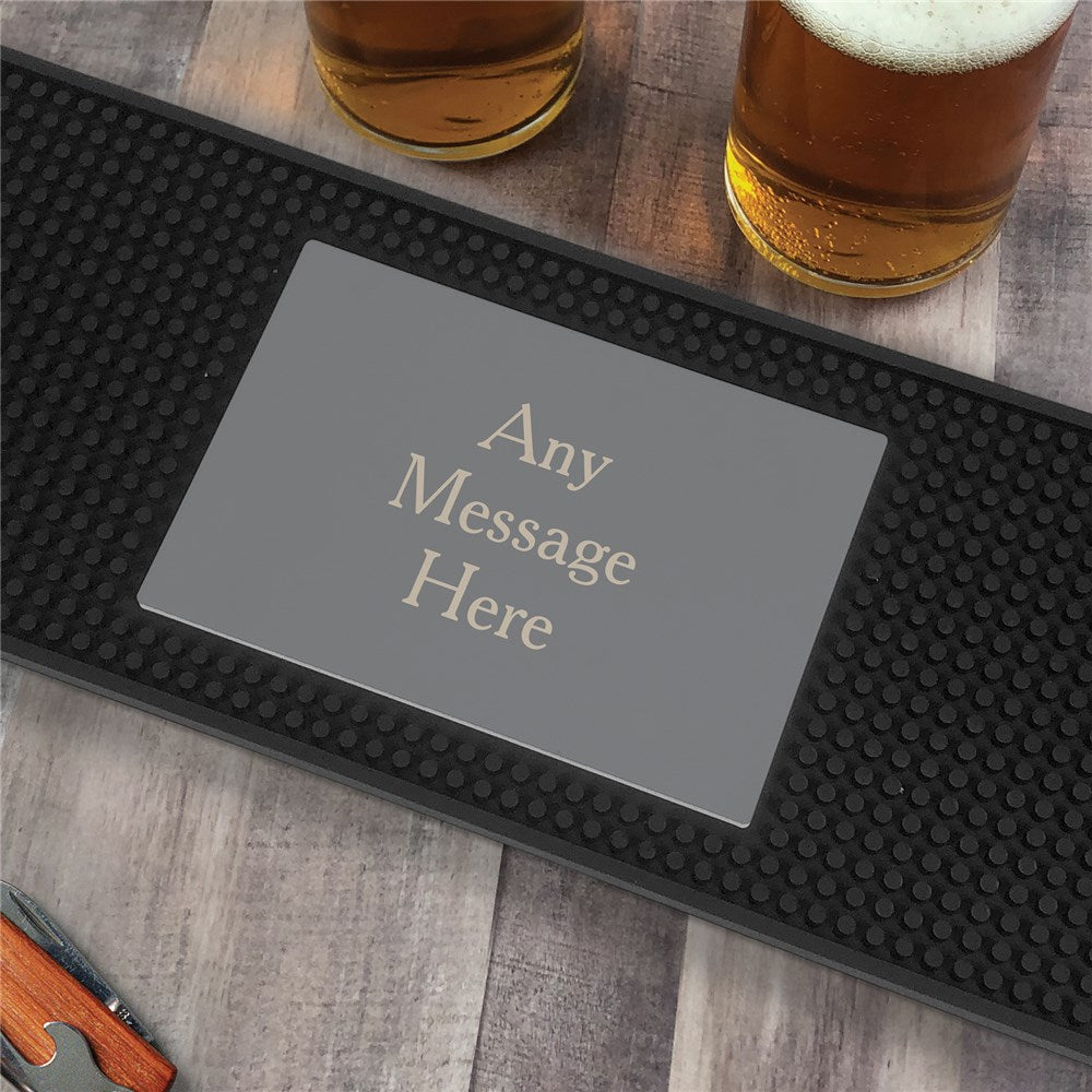 Custom bar mat in gray with three personalized text lines, made of molded PVC for home bars or kitchen counters.
